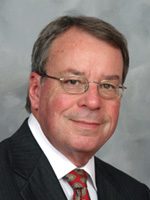 headshot of A. Raymond Madorin