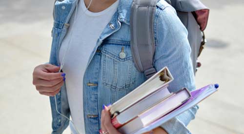 Student carrying books