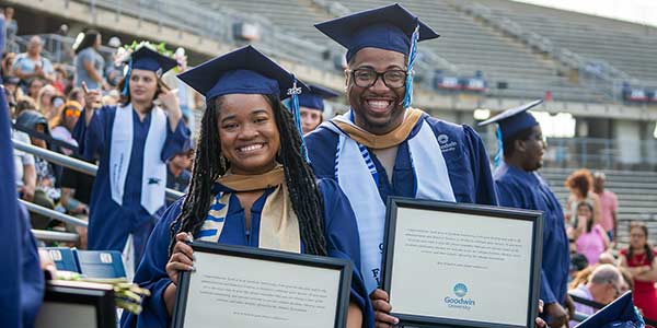 Two happy graduates at Goodwin&rsquo;s 2025 Commencement Ceremony