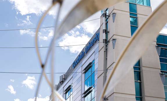 Closeup of Goodwin University sign on building