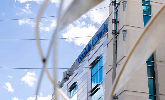 Closeup of Goodwin University sign on building