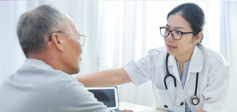 PMHNP student working on their computer