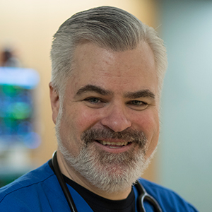 headshot of Ed Baxter