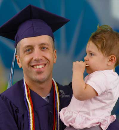 James in graduation cap and gown