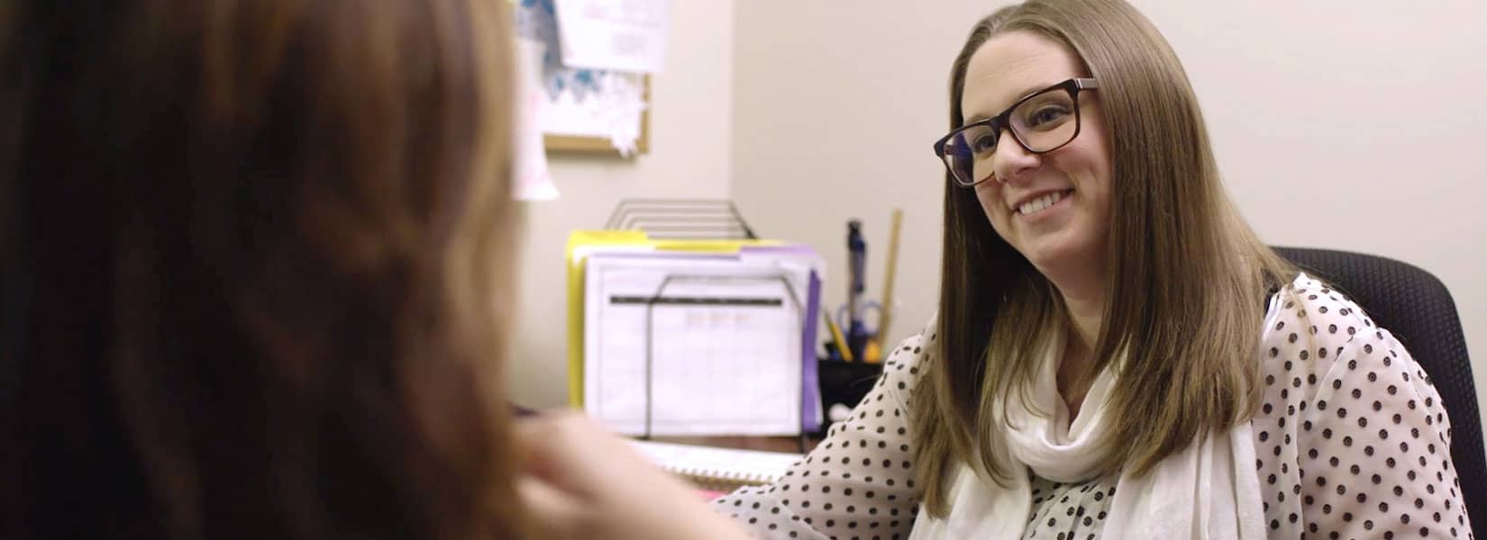 Goodwin students enjoying a visit from therapy dogs