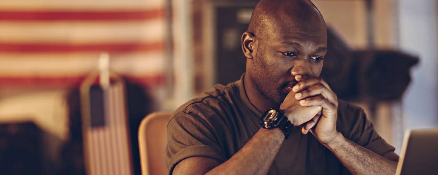 2 BSN students looking at a computer