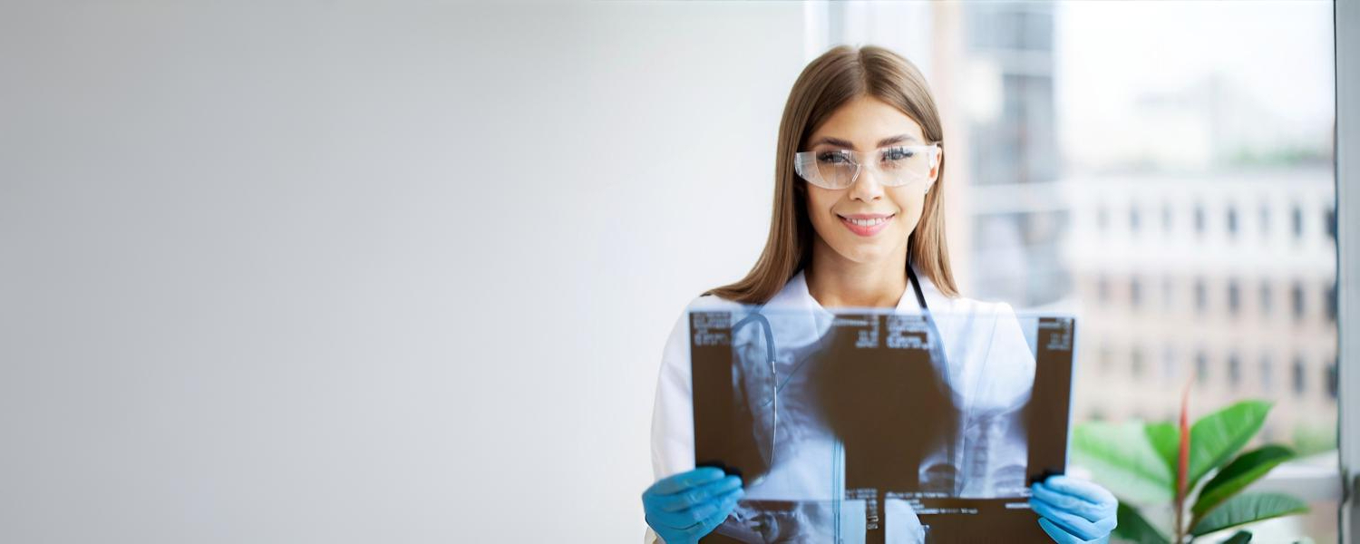 Radiographer looking at an xray